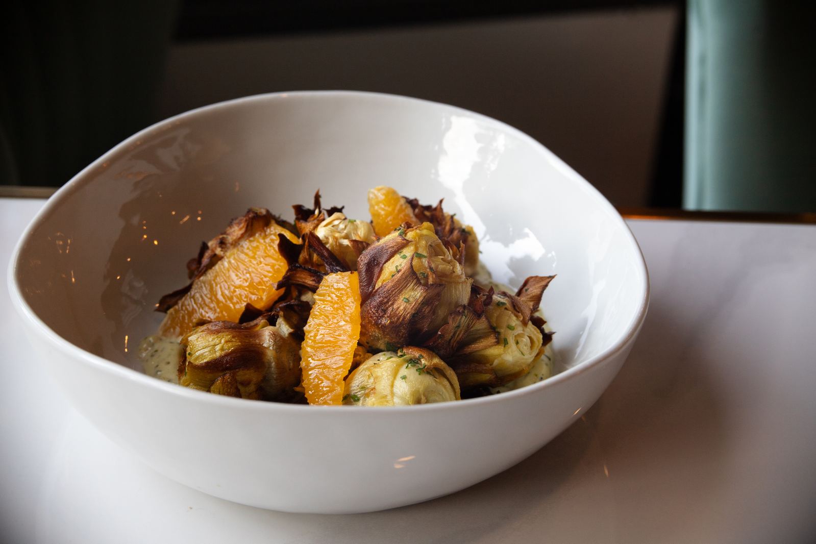 This Artichoke is a Beach Fire — citrus-marinated artichoke hearts at Solera Kitchen + Wine Bar in Seal Beach